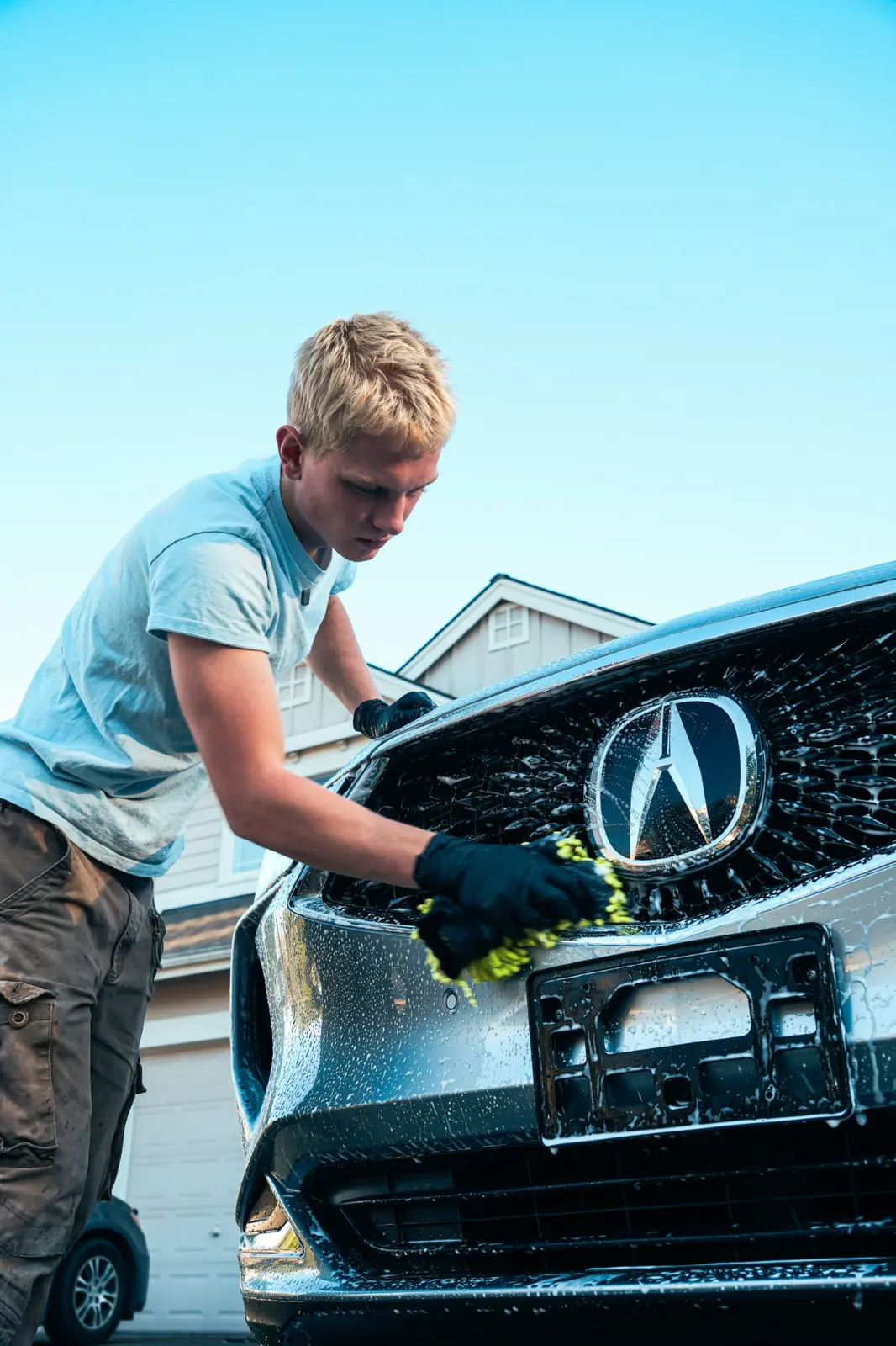 Washing an Acura grille before paint correction